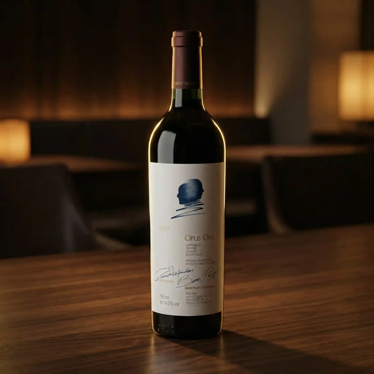 Opus One 2017 Napa Valley red wine bottle presented on walnut wooden table in warm luxury restaurant setting.